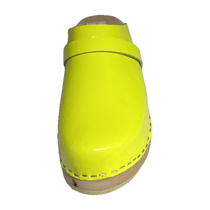 Neon yellow patent leather clog, front three-quarter view